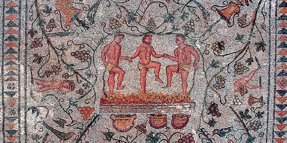 Mosaico de la Casa del Anﬁteatro en Mérida con escena de vendimia y pisa de la uva