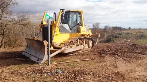 Excavadora en reservas