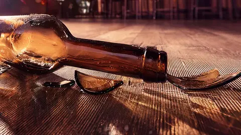 botella rota bar reyerta