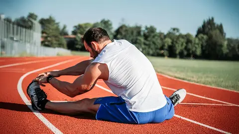estiramiento deporte atletismo running ejercicio atleta